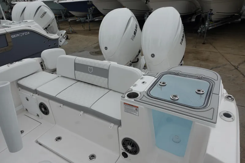  Yacht Photos Pics 2025 Sea Fox 268 Commander boat with dual engines and spacious seating area.