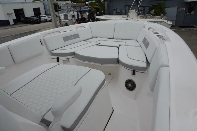  Yacht Photos Pics 2025 Sea Fox 268 Commander boat with spacious white seating area.
