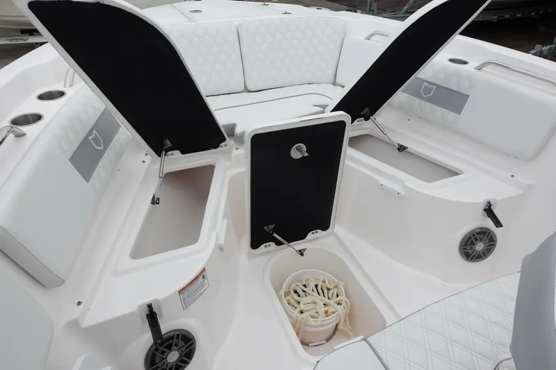  Yacht Photos Pics 2025 Sea Fox 268 Commander boat interior with open storage compartments and seating.
