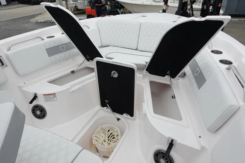  Yacht Photos Pics 2025 Sea Fox 268 Commander boat interior with open storage compartments and seating.