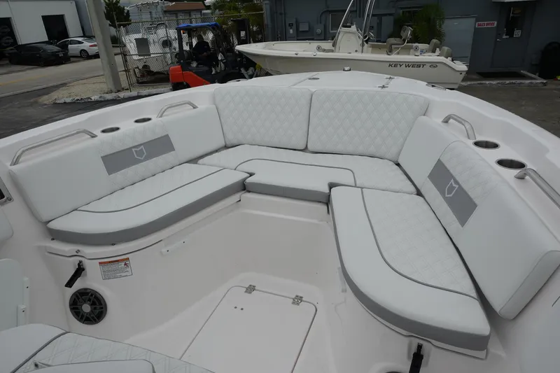  Yacht Photos Pics 2025 Sea Fox 268 Commander boat with spacious, cushioned seating area.