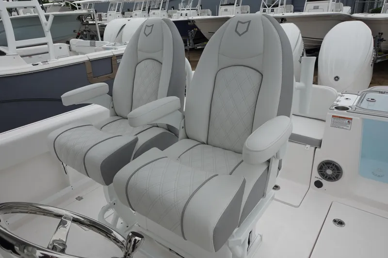  Yacht Photos Pics 2025 Sea Fox 268 Commander boat seats, featuring luxurious gray upholstery and ergonomic design.