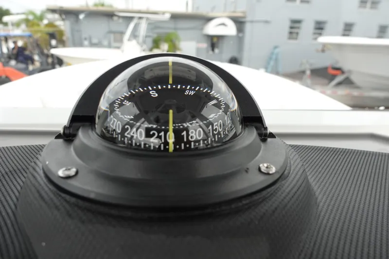  Yacht Photos Pics Compass on 2025 Sea Fox 268 Commander boat dashboard, showing south direction.