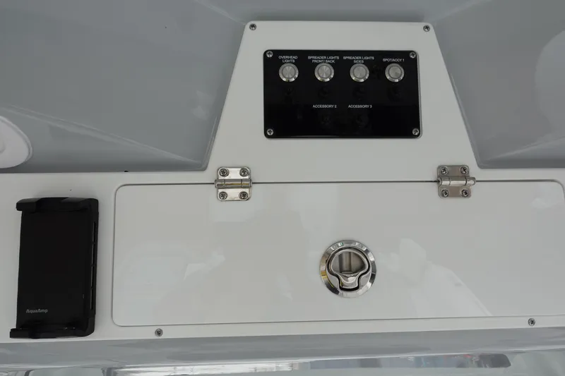  Yacht Photos Pics Control panel of 2025 Sea Fox 268 Commander boat with switches and storage compartment.