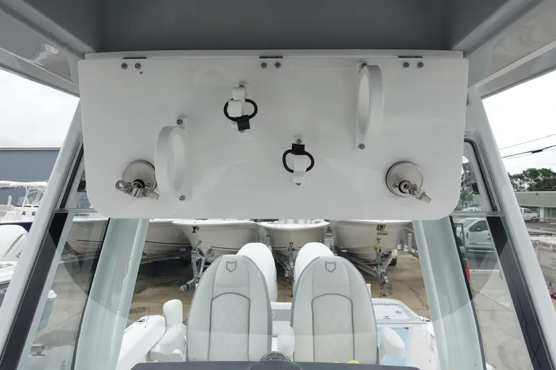  Yacht Photos Pics 2025 Sea Fox 268 Commander boat interior with rod holders and seating.