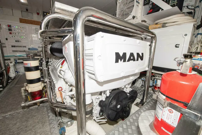 Satisfaction Yacht Photos Pics Engine room of 2017 Azimut 84 Flybridge yacht with MAN engine and safety equipment.