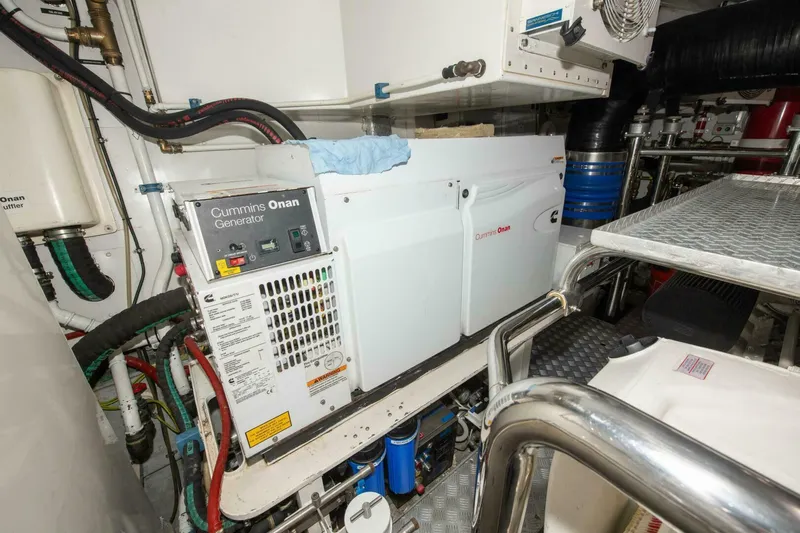 Satisfaction Yacht Photos Pics Engine room of 2017 Azimut 84 Flybridge yacht with Cummins Onan generator.
