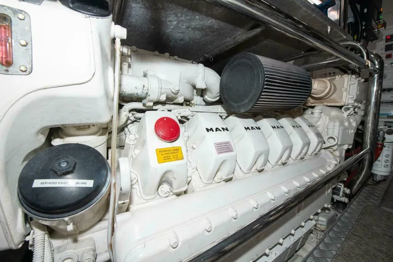 Satisfaction Yacht Photos Pics Engine room of 2017 Azimut 84 Flybridge yacht, featuring a MAN engine.