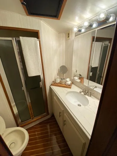 Lay A Wake Yacht Photos Pics Bathroom interior of 1990 Viking 53 Convertible yacht with shower and vanity.
