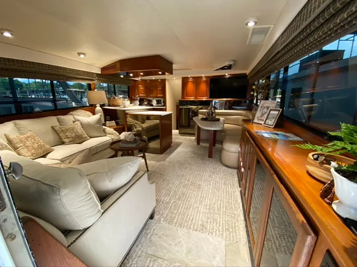 Lay A Wake Yacht Photos Pics Luxurious interior of a 1990 Viking 53 Convertible yacht with elegant furnishings and decor.