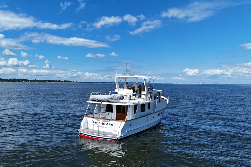 Marjorie Ann Yacht Photos Pics 2006 DeFever 52 Euro yacht on open water under a clear blue sky.