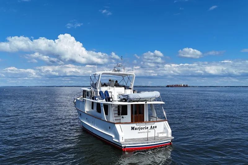 Marjorie Ann Yacht Photos Pics 2006 DeFever 52 Euro yacht on open water under a clear blue sky.
