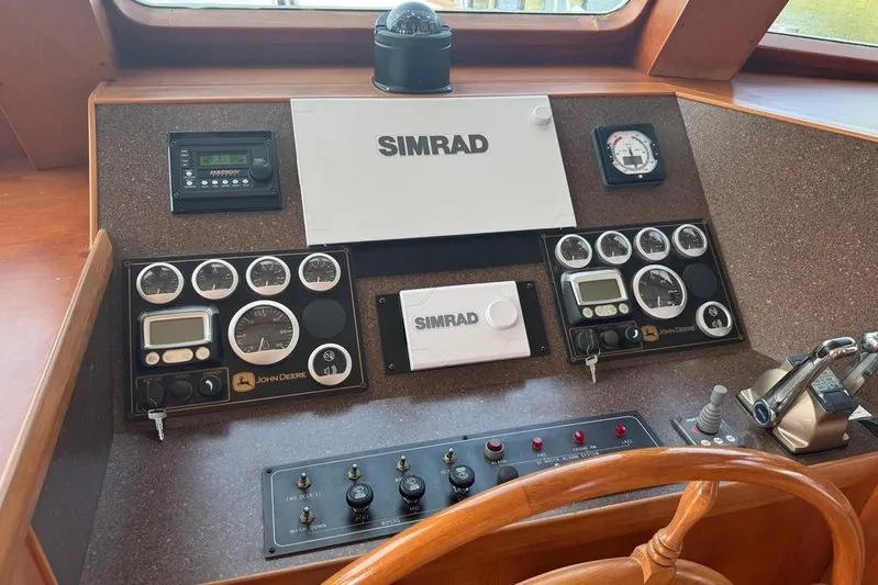 Marjorie Ann Yacht Photos Pics Control panel of 2006 DeFever 52 Euro yacht with Simrad navigation system.