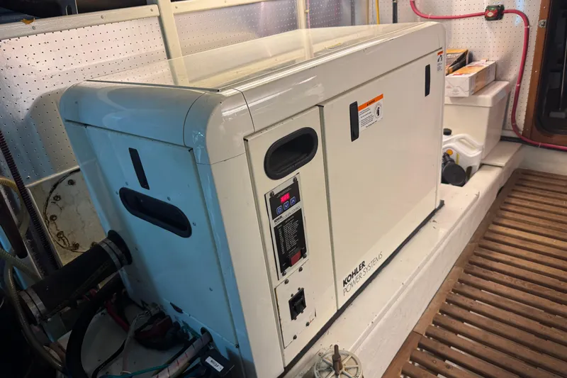 Marjorie Ann Yacht Photos Pics Kohler power system in 2006 DeFever 52 Euro yacht engine room.