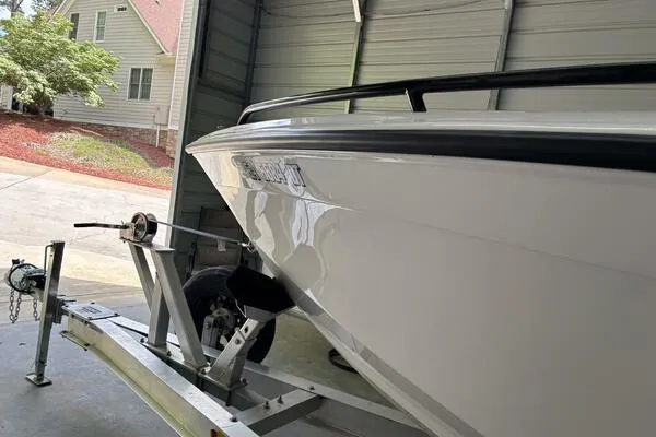  Yacht Photos Pics 2025 Concept 27' Open Deck boat on trailer in garage.