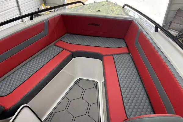  Yacht Photos Pics 2025 Concept 27' Open Deck boat interior with red and gray seating, hexagonal floor pattern.
