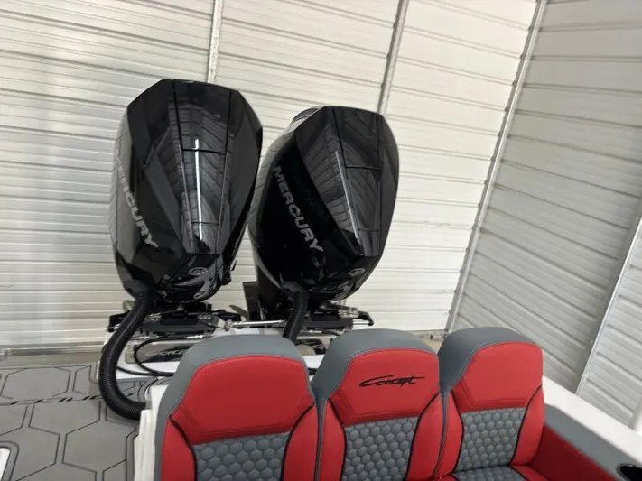  Yacht Photos Pics 2025 Concept 27' Open Deck boat with dual Mercury outboard engines and red-gray seating.