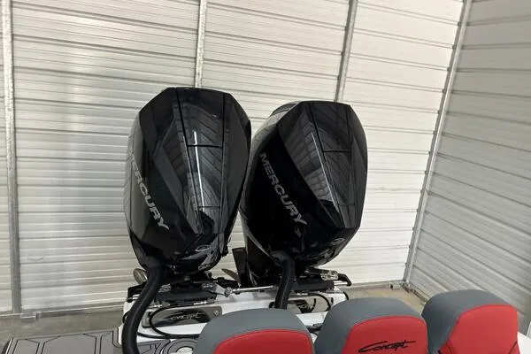  Yacht Photos Pics Twin Mercury outboard engines on a 2025 Concept 27' Open Deck boat in a garage.