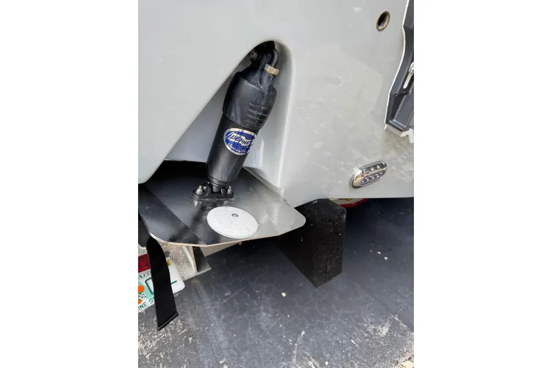  Yacht Photos Pics Close-up of 2023 Sea Hunt Gamefish 27 trim tab and hydraulic system.