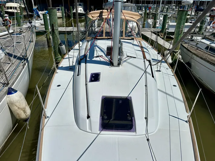 Celtic Rose Yacht Photos Pics 2018 Jeanneau Sun Odyssey 419 sailboat docked at marina, showcasing deck and rigging.