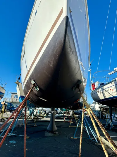 Celtic Rose Yacht Photos Pics 2018 Jeanneau Sun Odyssey 419 sailboat in dry dock, viewed from the bow.