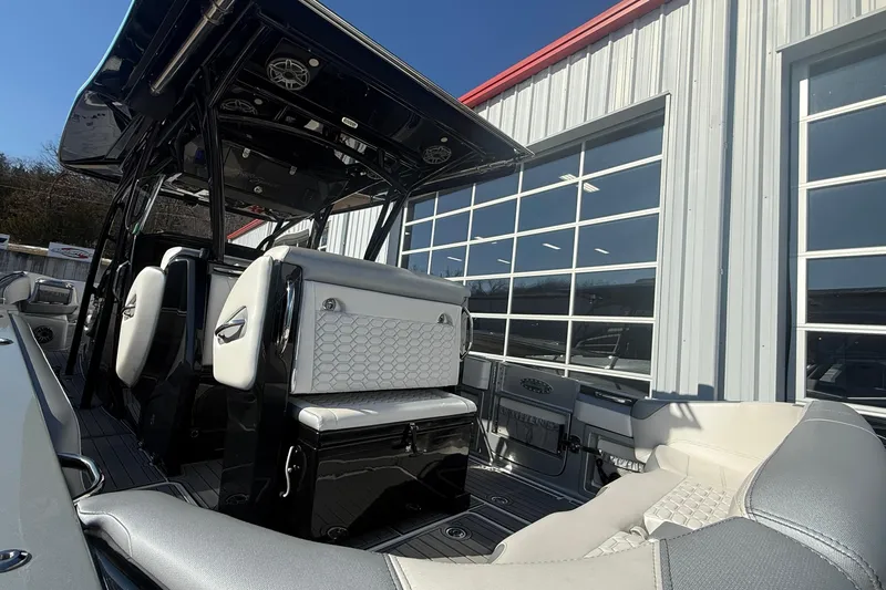  Yacht Photos Pics 2023 Nor-Tech 390 Sport Center Console boat interior with modern seating and sleek design.