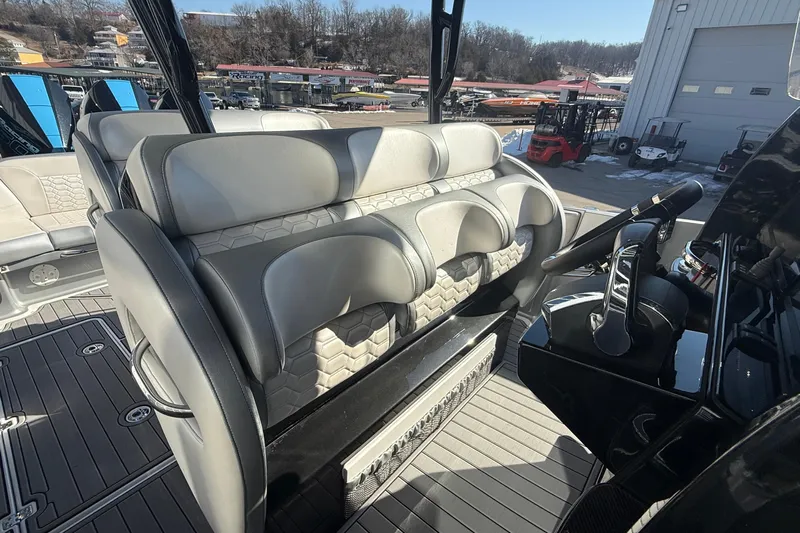  Yacht Photos Pics 2023 Nor-Tech 390 Sport Center Console interior with modern seating and steering console.