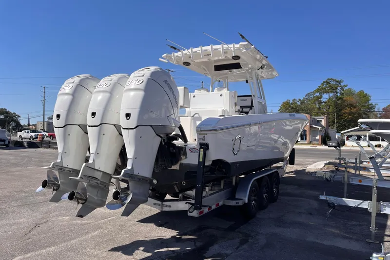  Yacht Photos Pics 2019 Fountain 38 Center Console boat with triple Mercury 350 engines on a trailer.