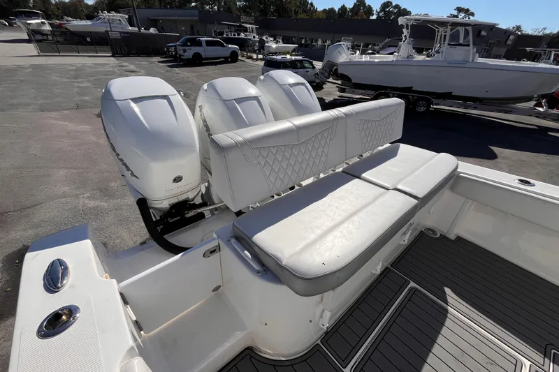  Yacht Photos Pics 2019 Fountain 38 Center Console boat with triple Mercury outboard engines and cushioned seating.
