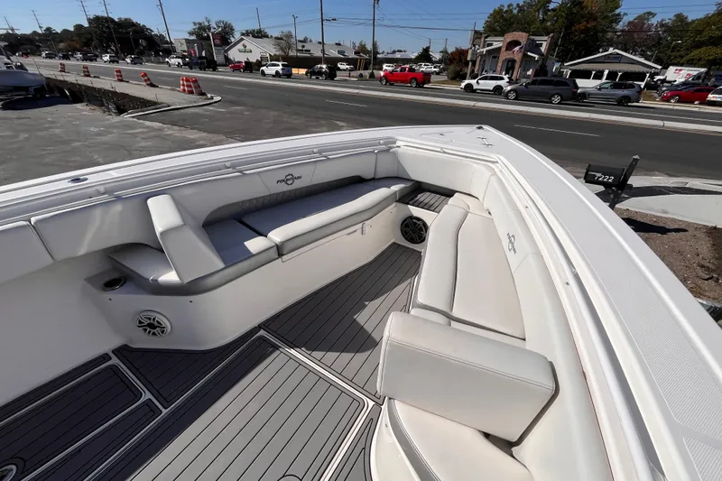  Yacht Photos Pics 2019 Fountain 38 Center Console boat interior with white seating and gray flooring.