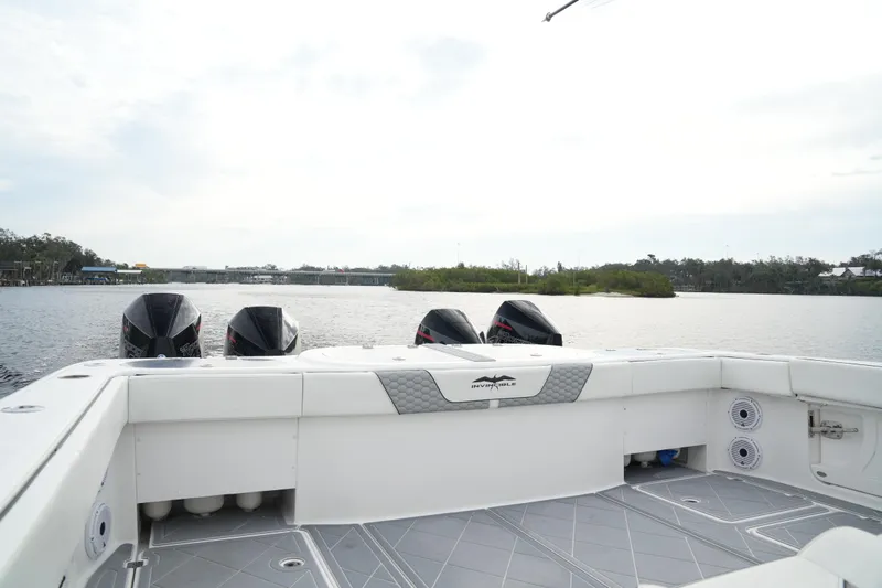 Amazing Grace Yacht Photos Pics Invincible 46 Catamaran 2022 on water, showcasing powerful engines and spacious deck.