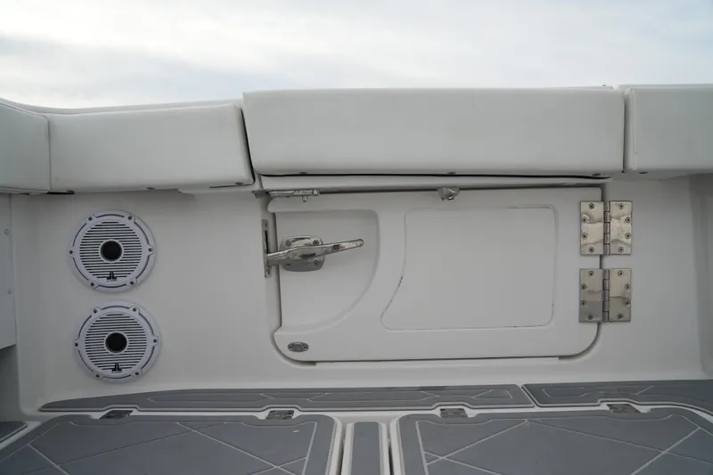 Amazing Grace Yacht Photos Pics Invincible 46 Catamaran 2022 interior detail with speakers and storage compartment.