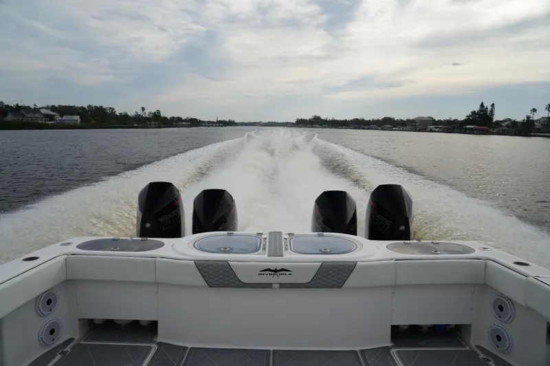 Amazing Grace Yacht Photos Pics Invincible 46 Catamaran 2022 cruising on a calm river with powerful engines.