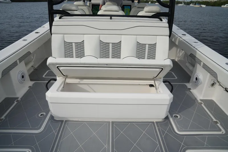 Amazing Grace Yacht Photos Pics 2022 Invincible 46 Catamaran with open storage compartment on deck.