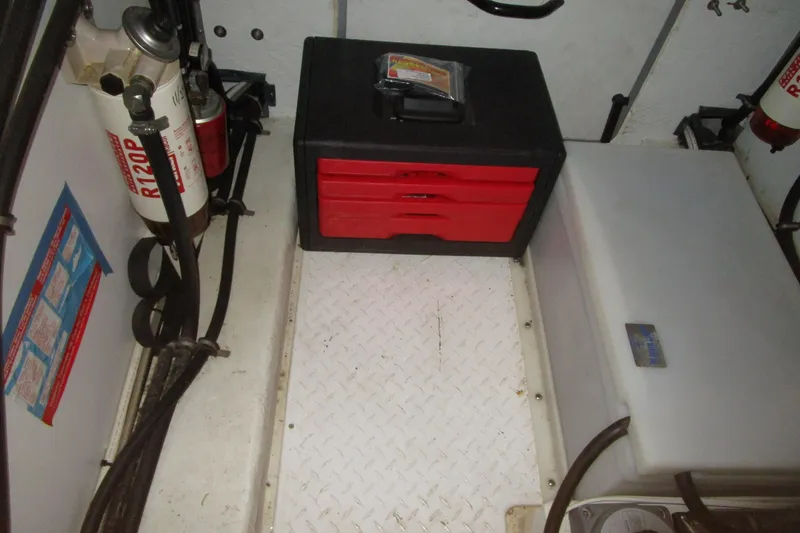 Yeah Yacht Photos Pics Engine room of 1999 Bayliner 4788 Pilot House Motoryacht with toolbox and equipment.