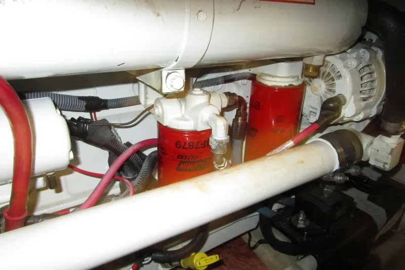Yeah Yacht Photos Pics Engine compartment of a 1999 Bayliner 4788 Pilot House Motoryacht, showing filters and wiring.