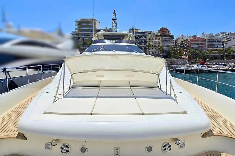 M/y Bleu Blanc Yacht Photos Pics Luxurious 2009 Ferretti Custom Line 97 yacht docked in a vibrant marina.