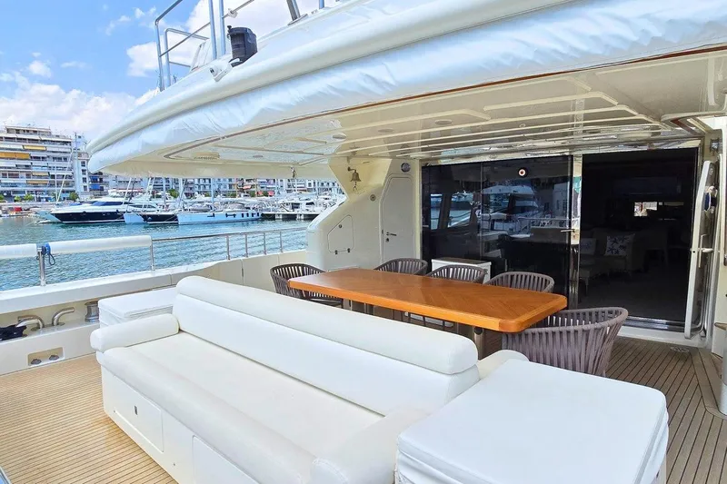 M/y Bleu Blanc Yacht Photos Pics Luxurious 2009 Ferretti Custom Line 97 yacht with elegant outdoor seating and dining area.