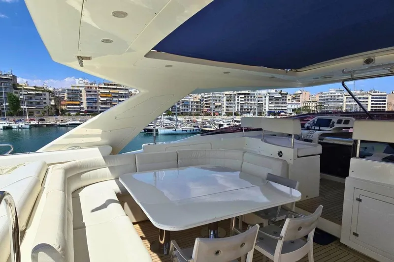 M/y Bleu Blanc Yacht Photos Pics Luxurious 2009 Ferretti Custom Line 97 yacht with spacious outdoor seating area.