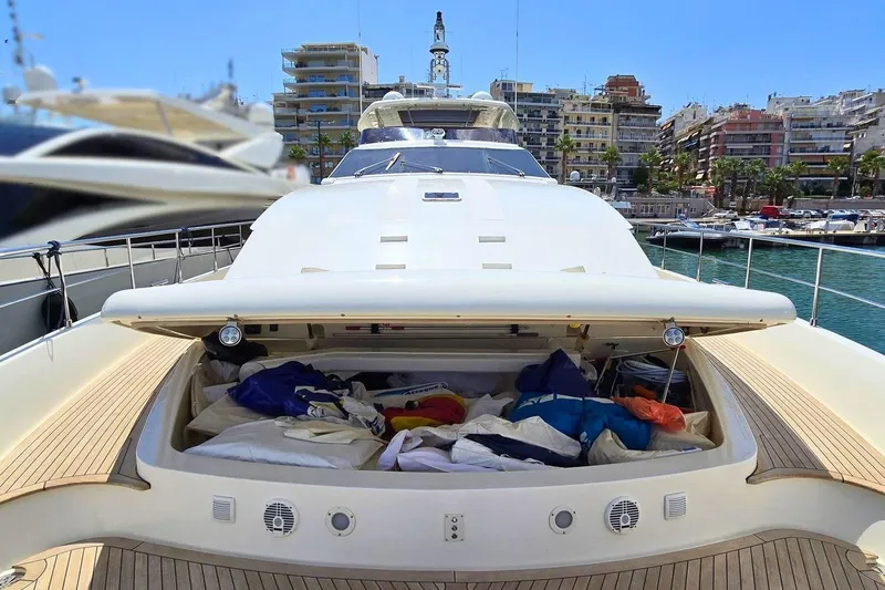 M/y Bleu Blanc Yacht Photos Pics 2009 Ferretti Custom Line 97 yacht with open storage compartment at marina.