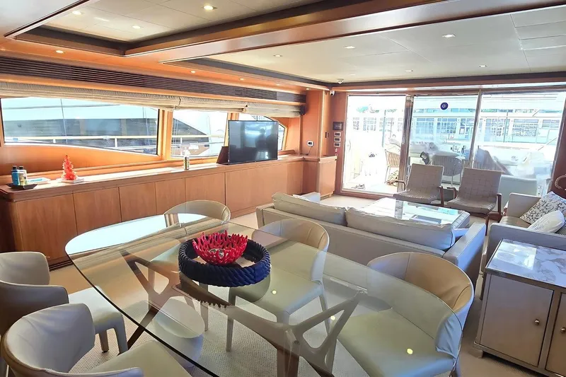 M/y Bleu Blanc Yacht Photos Pics Luxurious interior of 2009 Ferretti Custom Line 97 yacht with elegant seating and decor.