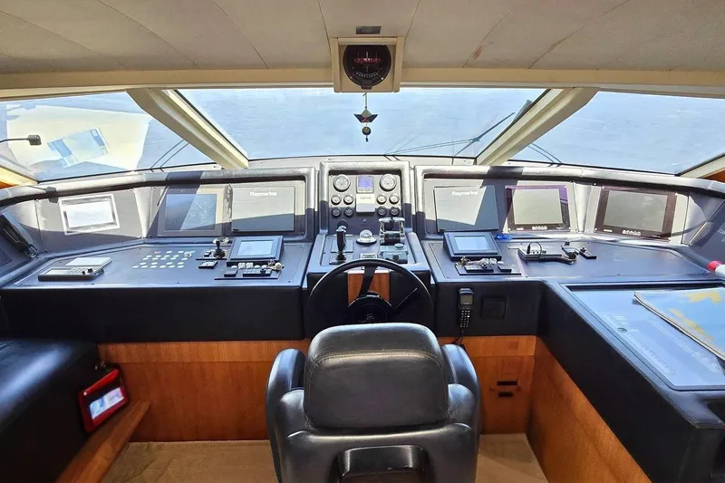 M/y Bleu Blanc Yacht Photos Pics Cockpit of 2009 Ferretti Custom Line 97 yacht with advanced navigation systems.
