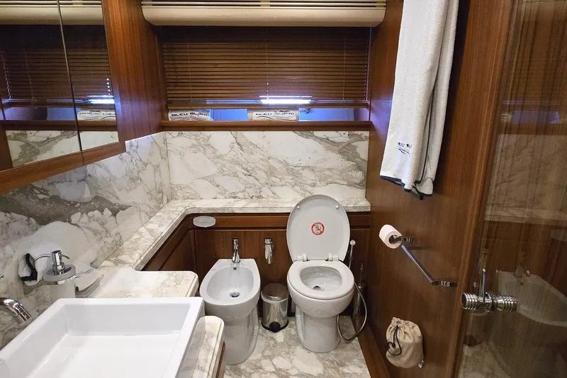 M/y Bleu Blanc Yacht Photos Pics Luxurious marble bathroom in 2009 Ferretti Custom Line 97 yacht.