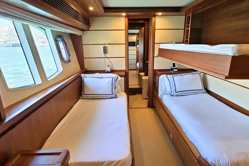M/y Bleu Blanc Yacht Photos Pics Luxurious cabin interior of 2009 Ferretti Custom Line 97 yacht with twin beds.