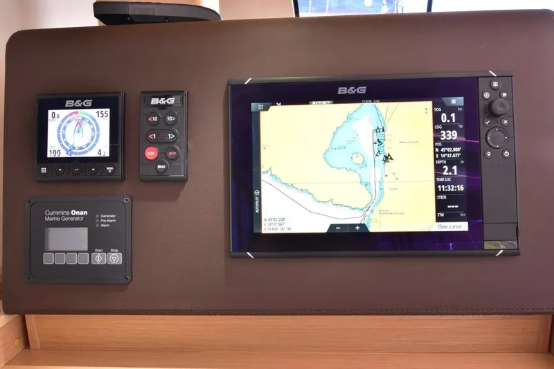 Stefany Yacht Photos Pics Navigation system on 2019 Nautitech 46 Fly yacht, featuring B&G displays and Cummins Onan generator controls.