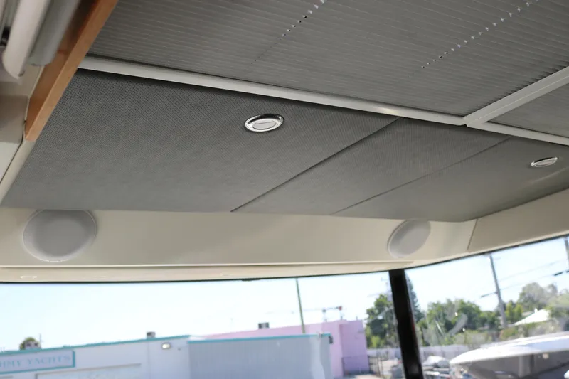 Ocean Therapy Yacht Photos Pics Ceiling interior of 2021 Nimbus C-11 with speakers and lighting.