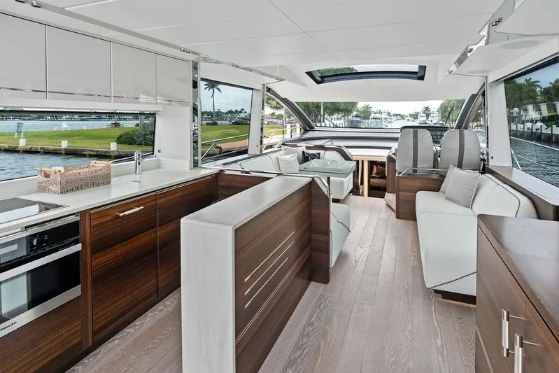  Yacht Photos Pics Luxurious interior of 2022 Sunseeker 65 Sport Yacht with modern design and spacious layout.