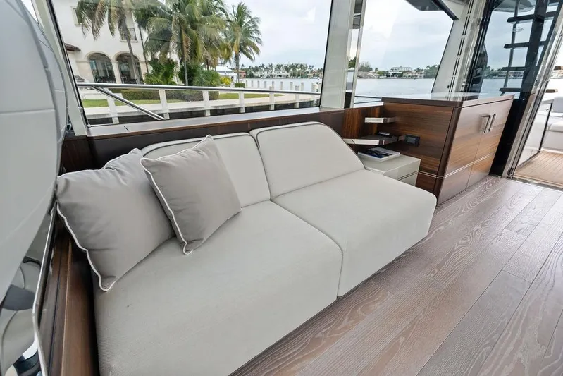  Yacht Photos Pics Luxurious interior of 2022 Sunseeker 65 Sport Yacht with elegant seating and modern design.