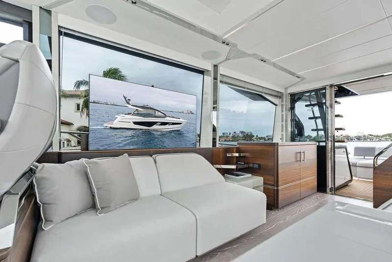  Yacht Photos Pics Luxurious interior of 2022 Sunseeker 65 Sport Yacht with modern design and large windows.