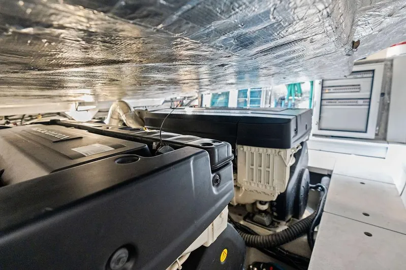  Yacht Photos Pics Engine room of 2022 Sunseeker 65 Sport Yacht, showcasing advanced machinery and equipment.